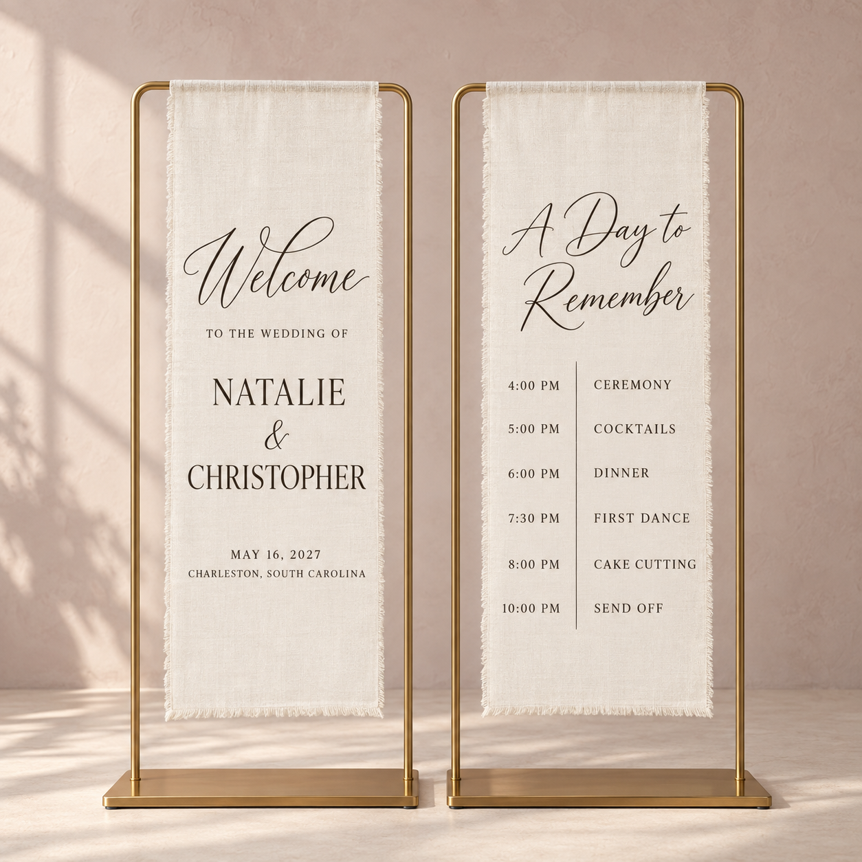 Coordinated linen welcome and order of events signs on gold stands