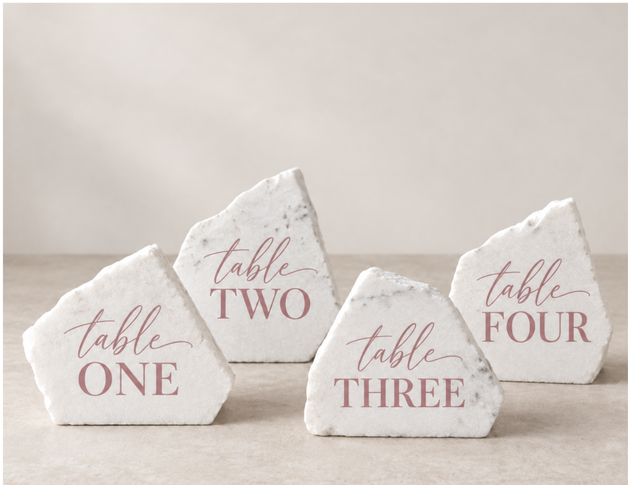 Custom stone table numbers with blush lettering